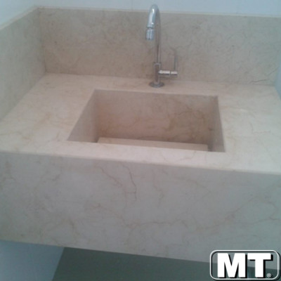 Lavatório em Crema Marfil com Cuba Esculpida
